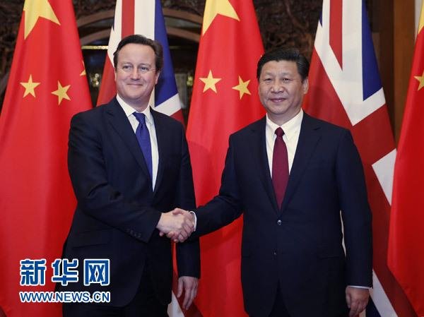 12月2日，國家主席習近平在北京釣魚臺國賓館會見英國首相卡梅倫。 新華社記者 鞠鵬 攝