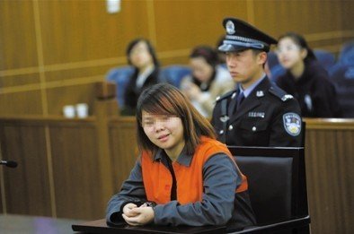 2013年4月3日，被告人小萍在法庭上受審。新京報記者 王貴彬 攝