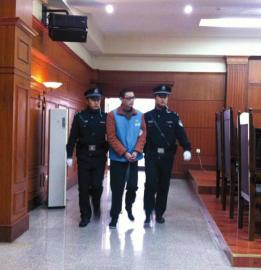 趙勇被帶上法庭。