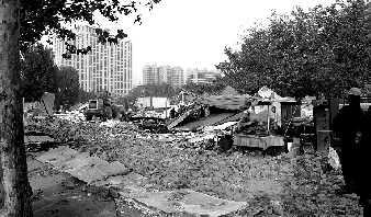 對公園選址的5.5萬多平方米的違章建筑進行拆除。