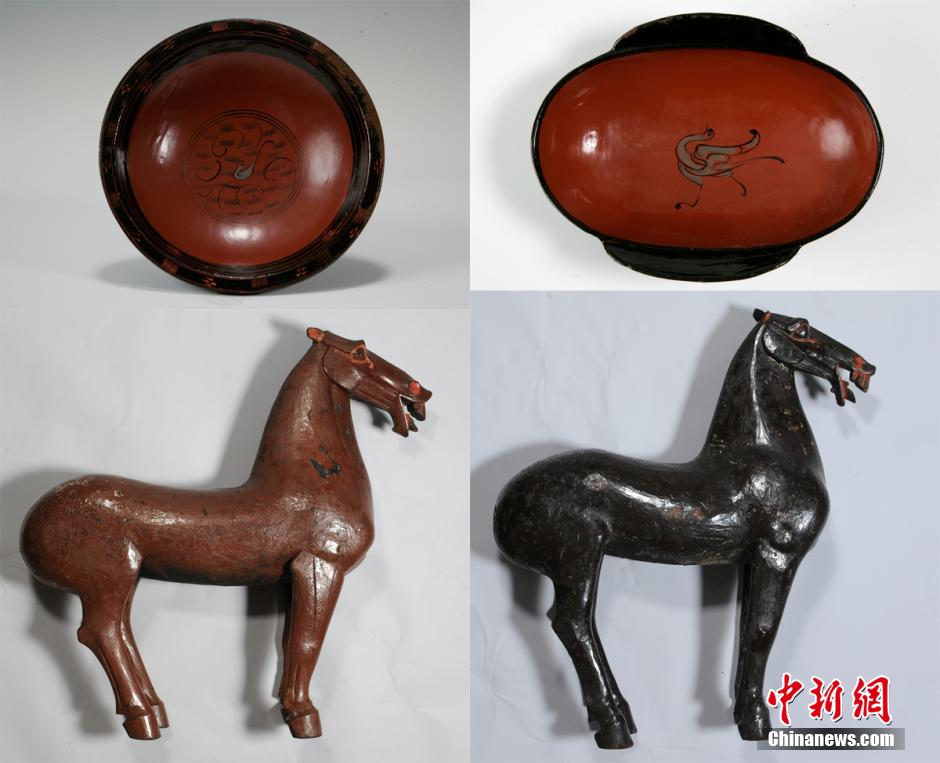 圖為出土漆器240余件，器形有耳杯、奩、幾、盤(pán)、盒、俑、馬等。
