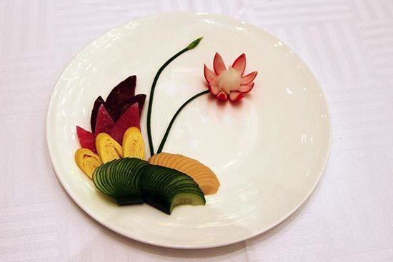 迎賓冷盤(pán)“洋花蘿卜”。 花惠生 供圖