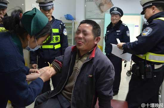 酒駕男被查爆雷人話語(yǔ)：心中有佛不會(huì)出車(chē)禍(圖)