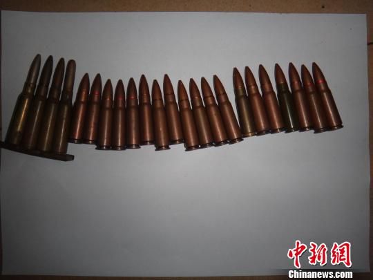 覃某主動上交的23發(fā)子彈?！＄娦馈z